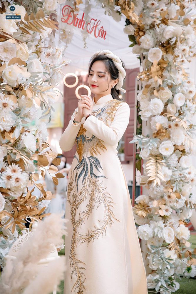 May áo dài cưới với vải satin 
